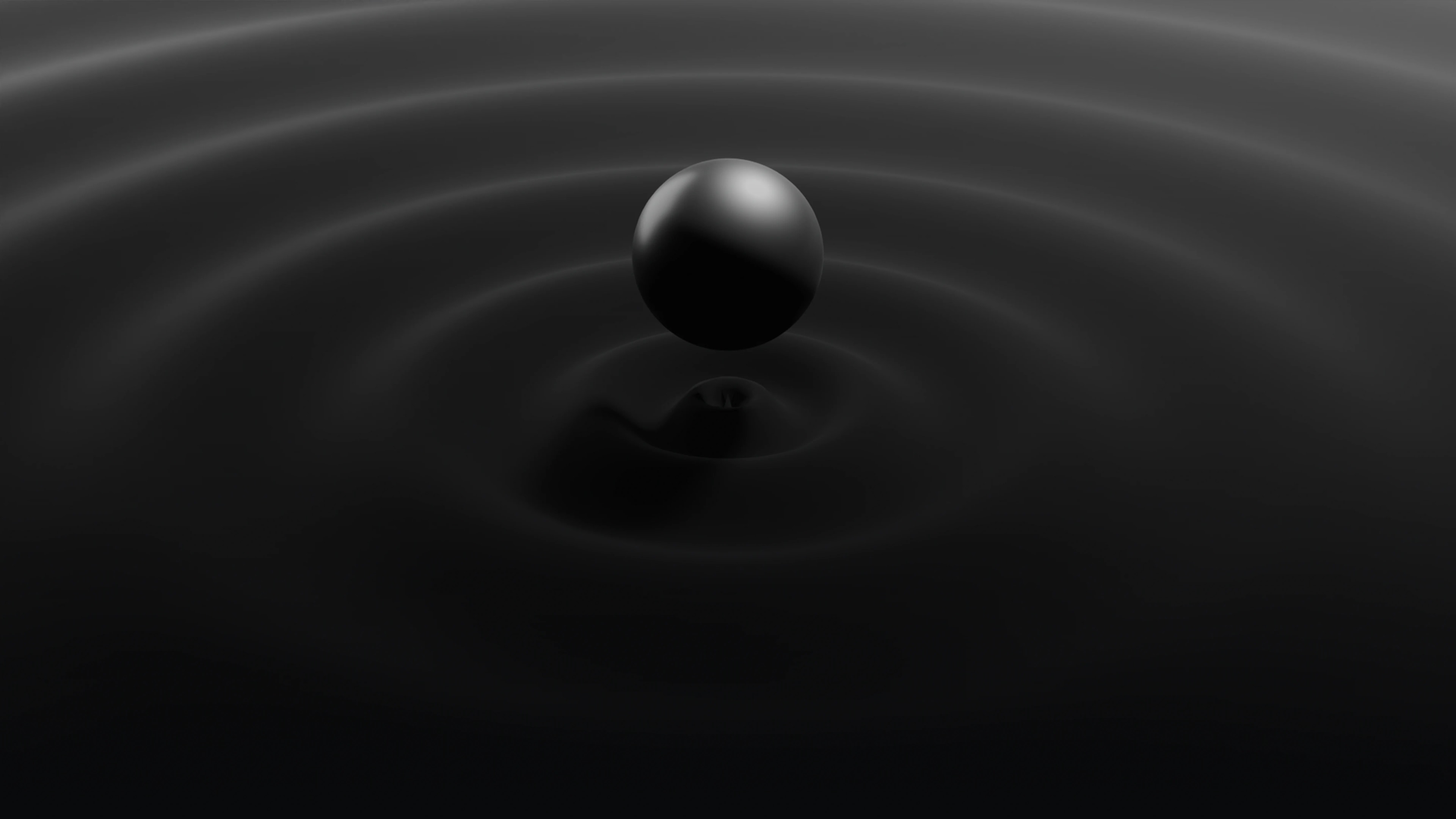 Sphere above a dark rippled surface